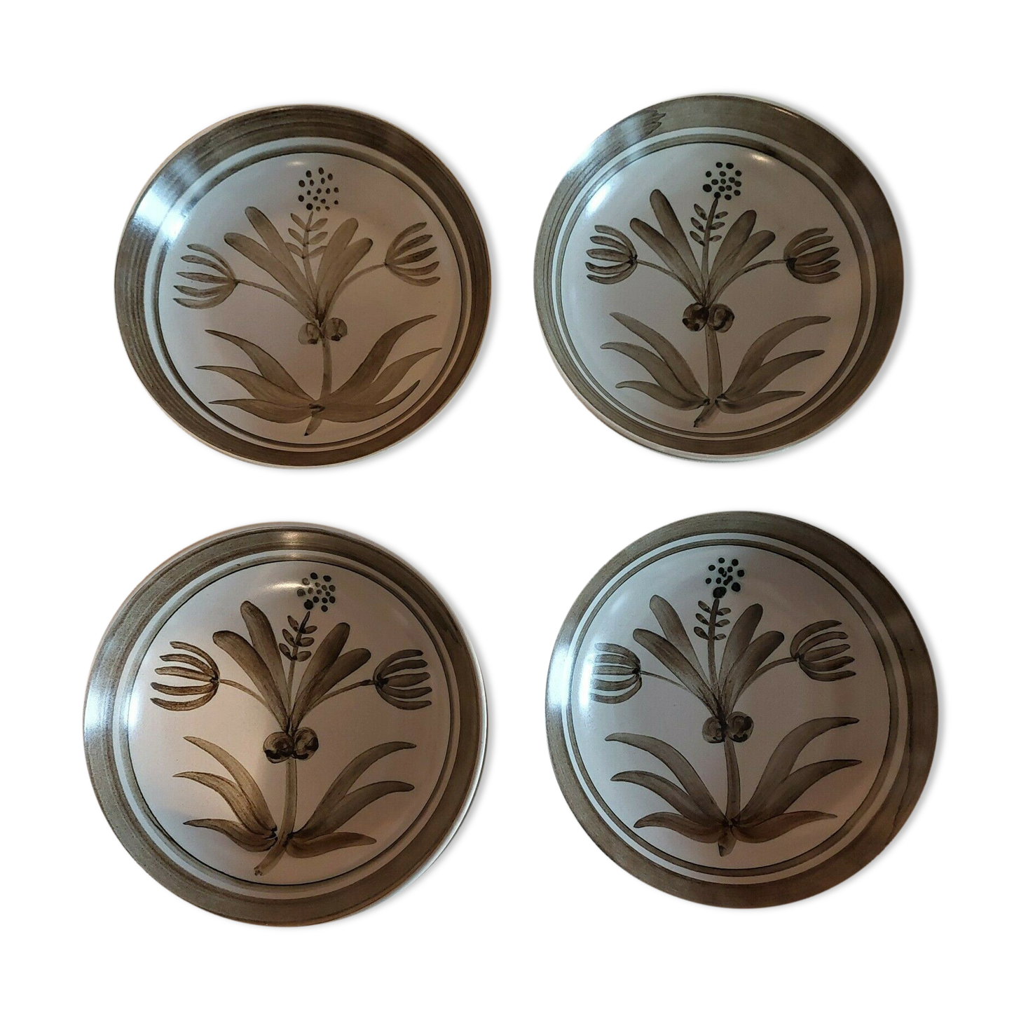 Vintage hollow plates in sandstone series of four marked Longchamp