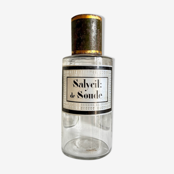 Flacon d'apothicaire Salycil: de Soude en verre transparent et métal vert