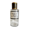 Salycil apothecary bottle: soda in transparent glass and green metal