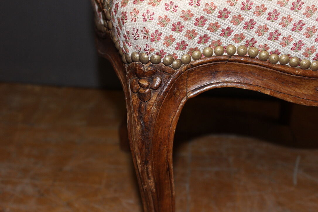 Pair of Louis XV period convertible armchairs