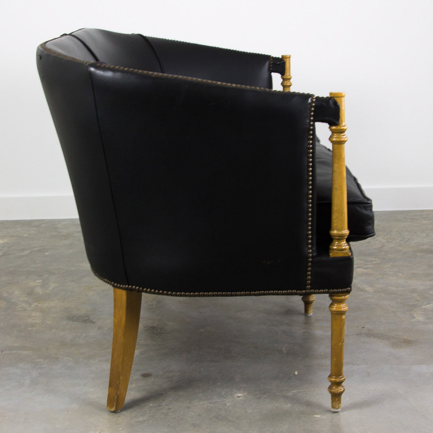 Black leather club sofa