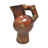 Rough pitcher in sandstone
