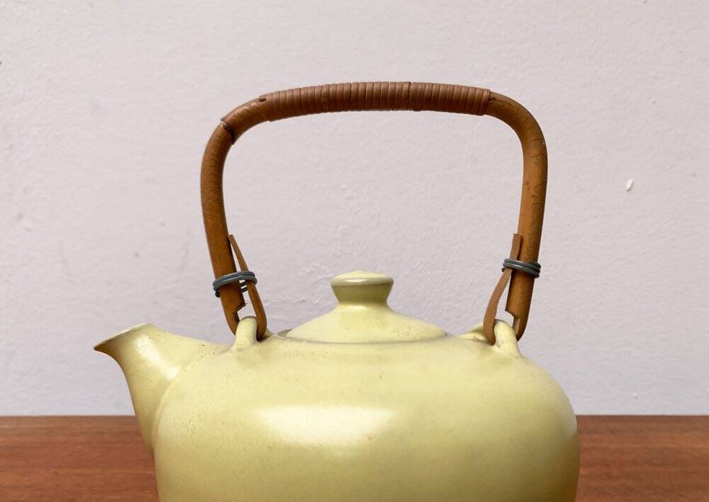 Mid-century ceramic teapot with bamboo handle, 1960s.