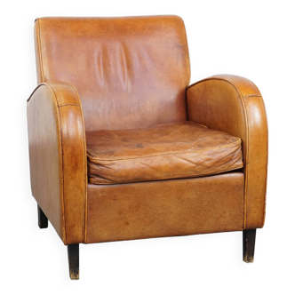 Fauteuil en cuir de mouton marron