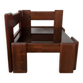 Modernist coffee table in wood and smoked glass.
