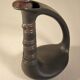 Zoomorphic pitcher vase in black ceramic