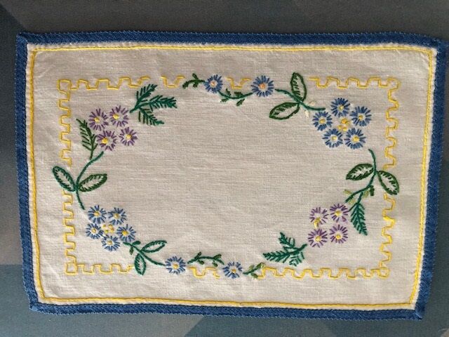 Two hand-embroidered placemats 30x20cm