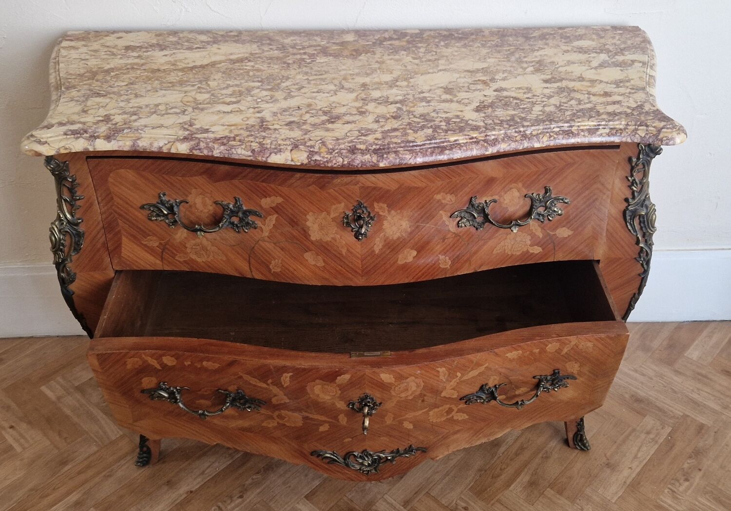Louis XV style commode, pink and ochre marble.