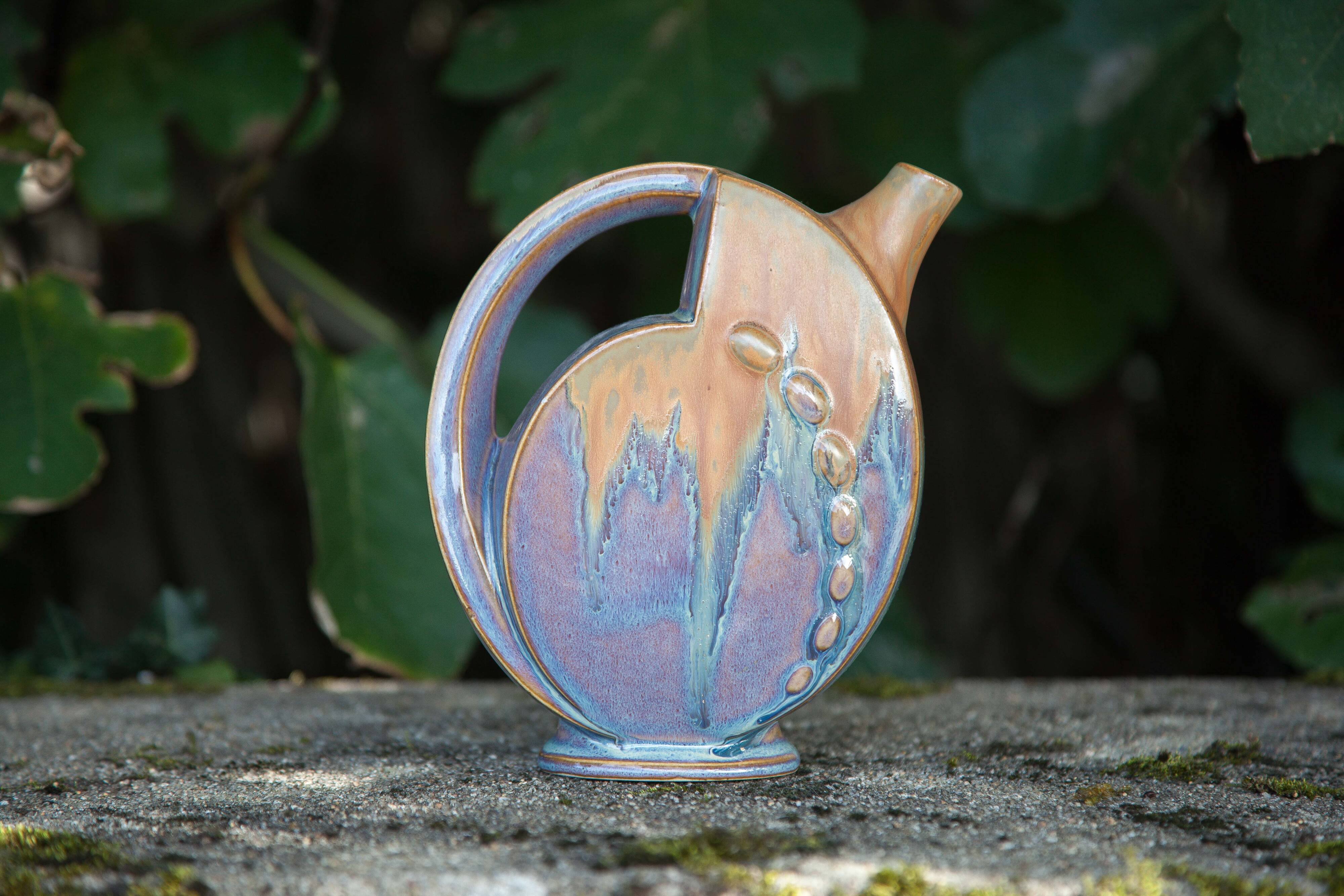 Flamed enameled stoneware bottle, pitcher, liquor bottle signed Denbac number 610, art vase