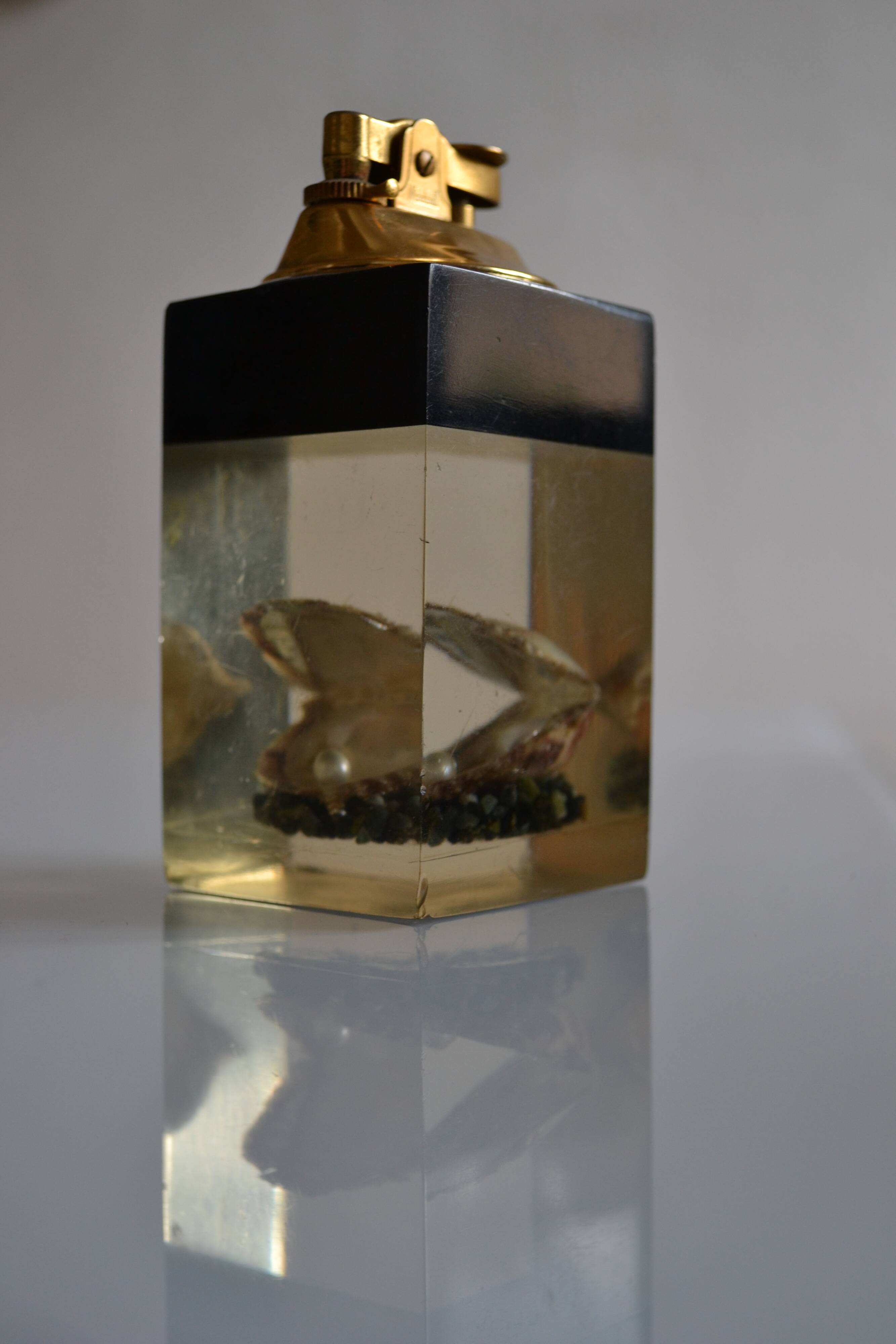 1970 Table lighter with pearl oyster in resin inclusion