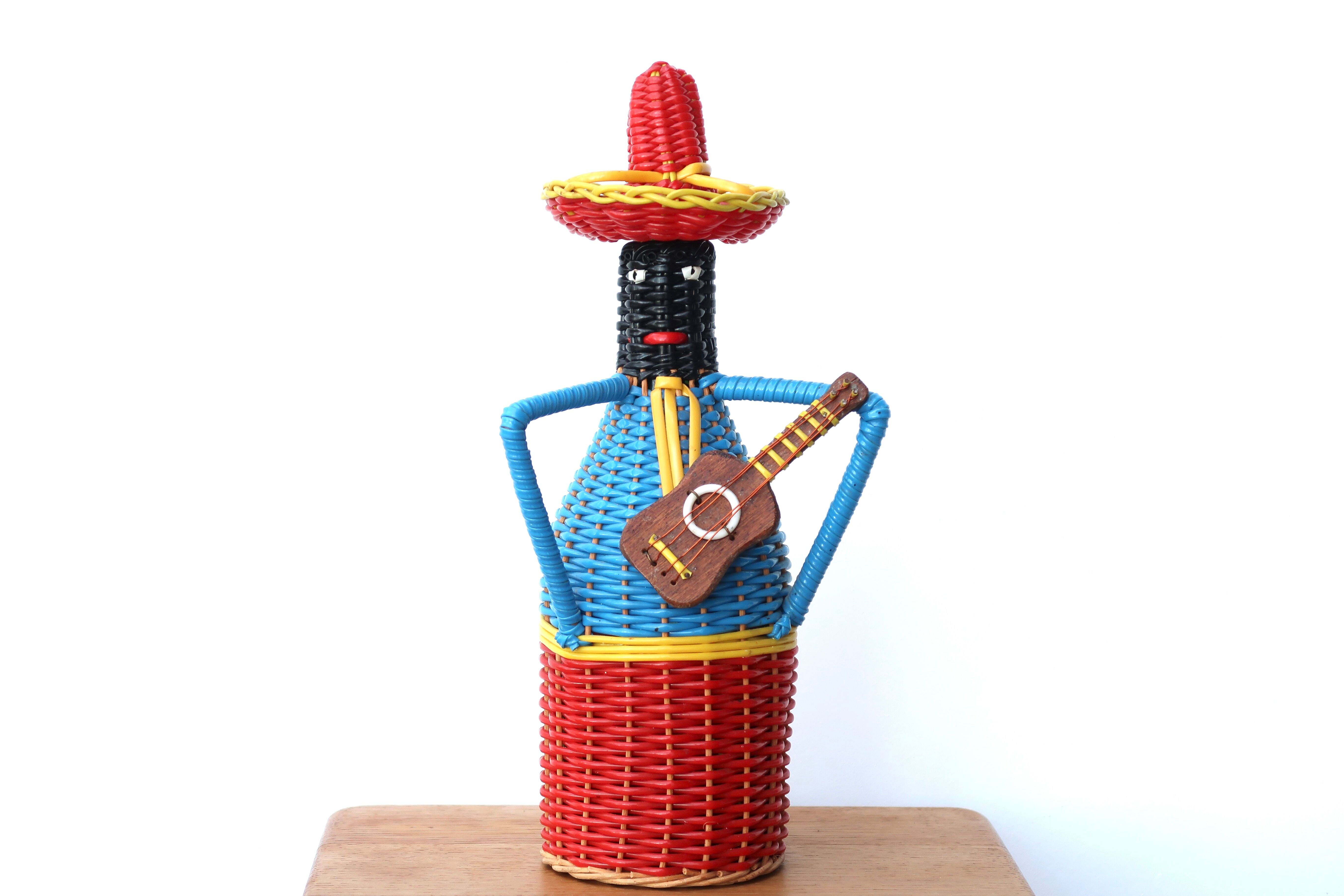Bottle covered with scoubidou, musician, 60s