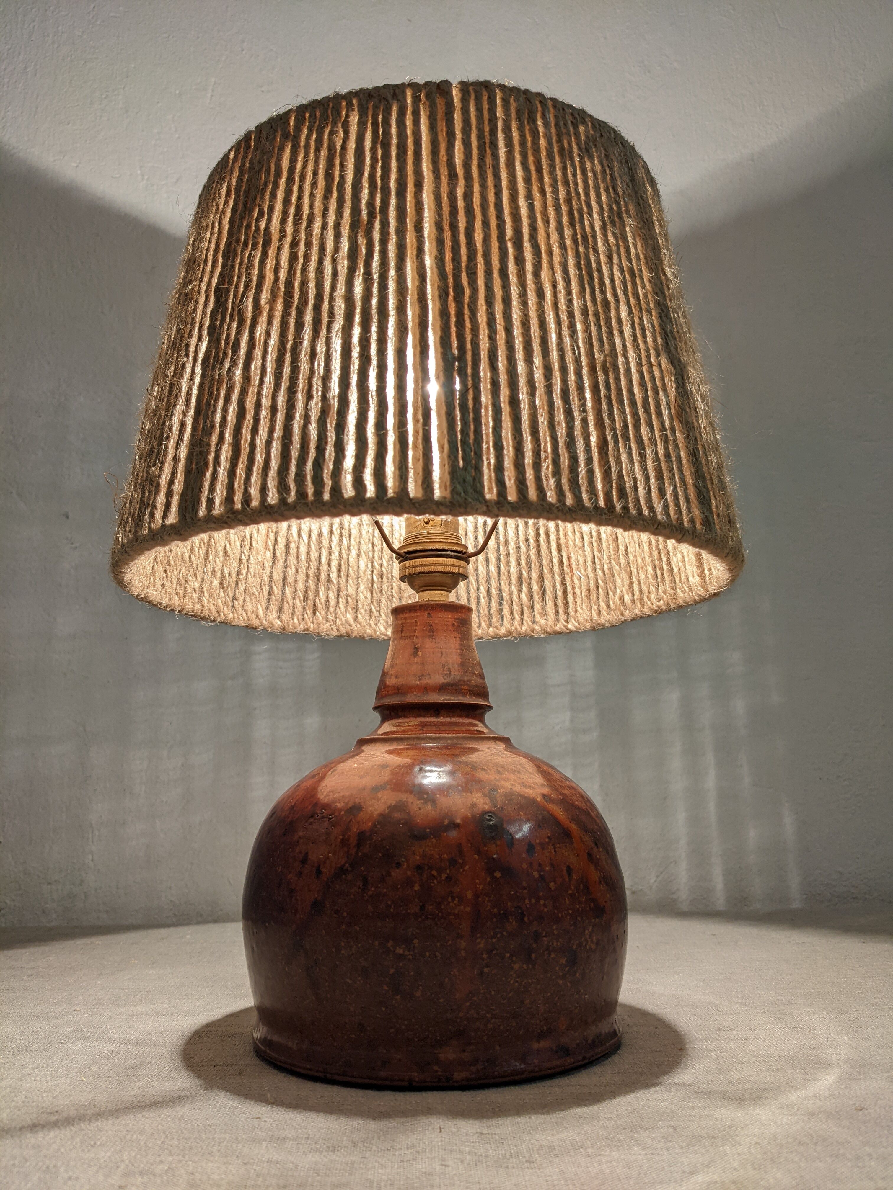 Vintage varnished stoneware lamp and jute rope