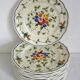 12 anciennes assiettes à dessert Longchamp décor fleuri