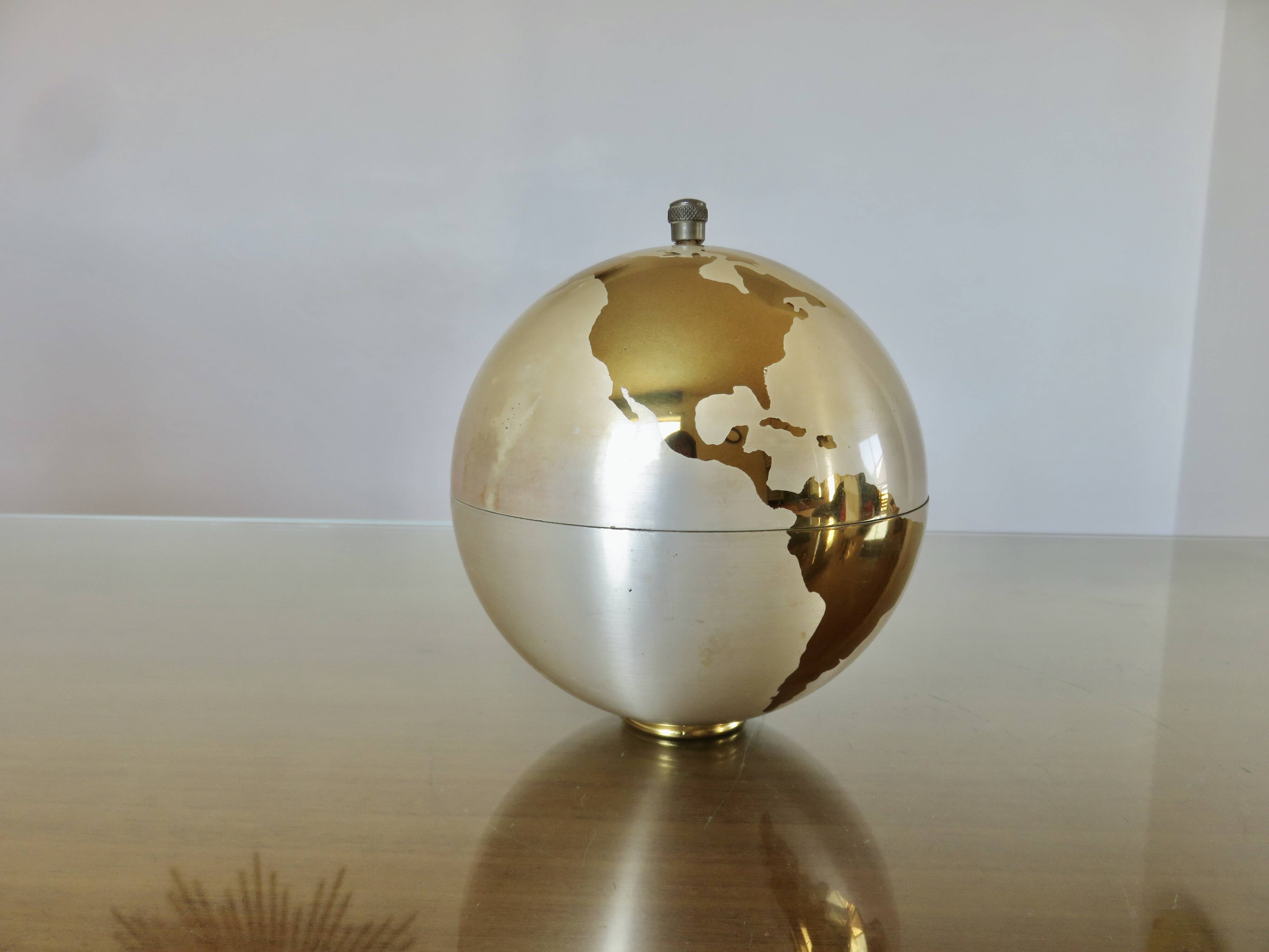 Large terrestrial globe, cigarette dispenser, brass, 1960 - 1970