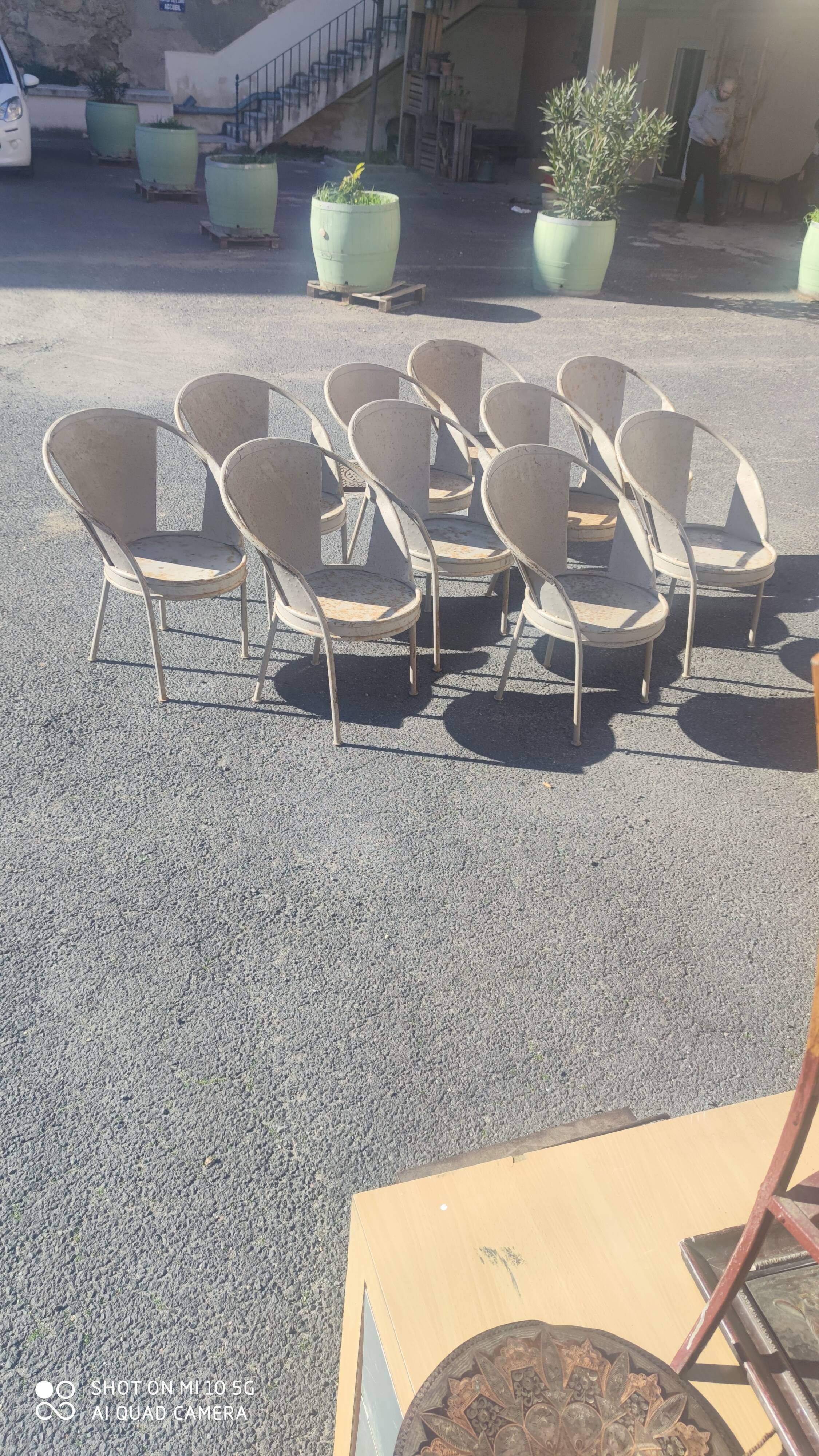 Series of 10 garden chairs made of steel garden patina