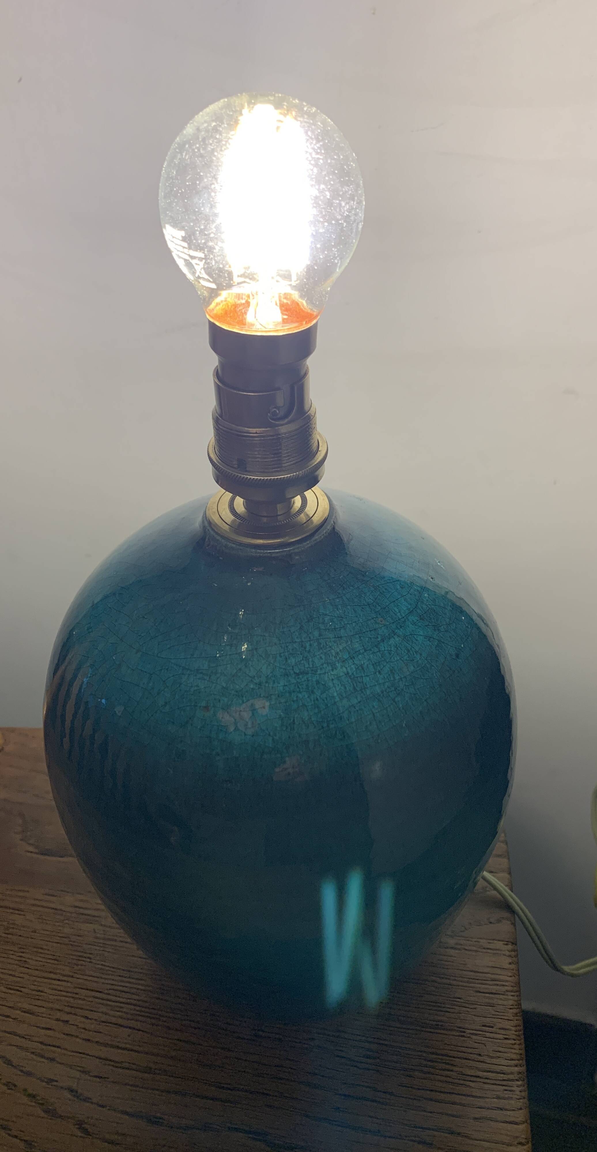 Cracked and signed ceramic ball lamp base, blue-green tones