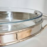 Oval Pyrex gratin dish, silver-plated metal stand.