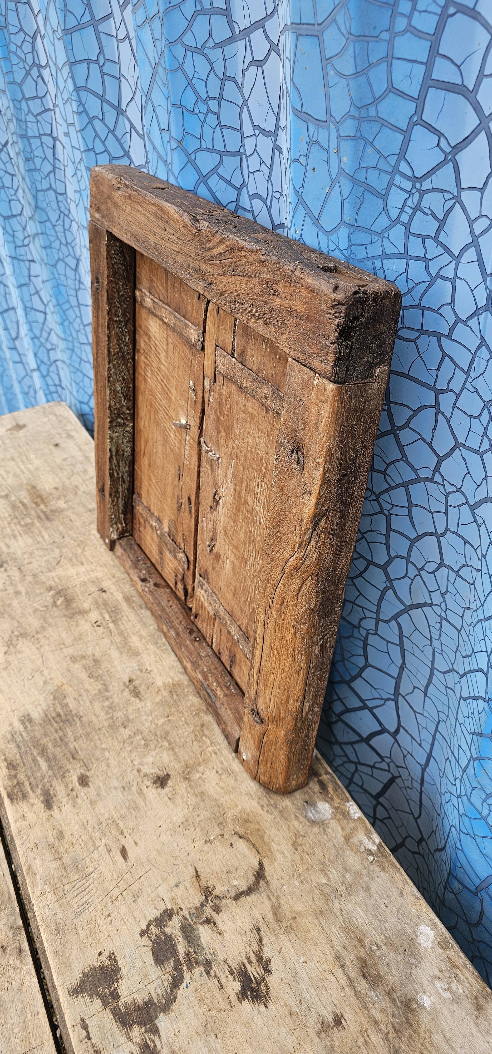 Old wooden tribal window
