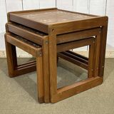Set of 3 nesting tables in teak with tiled tops.