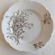 Plate with scalloped edge in antique earthenware