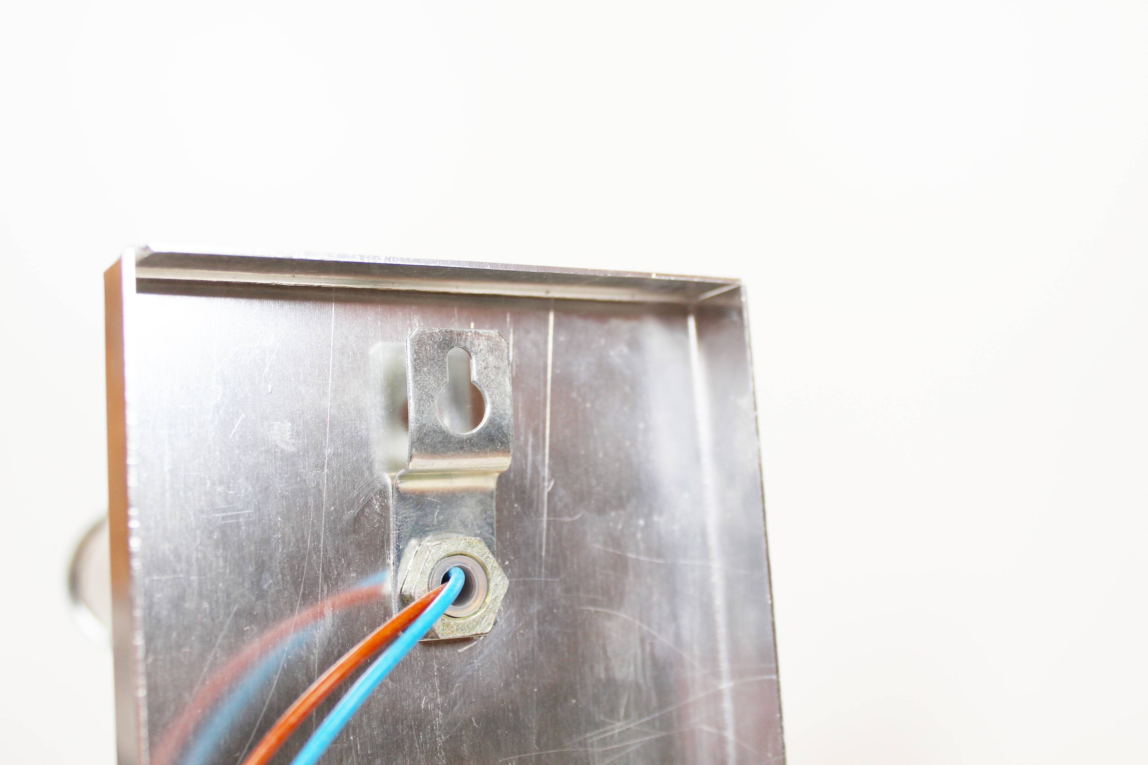 Pair of polished wall lamps by Gaetano Sciolari