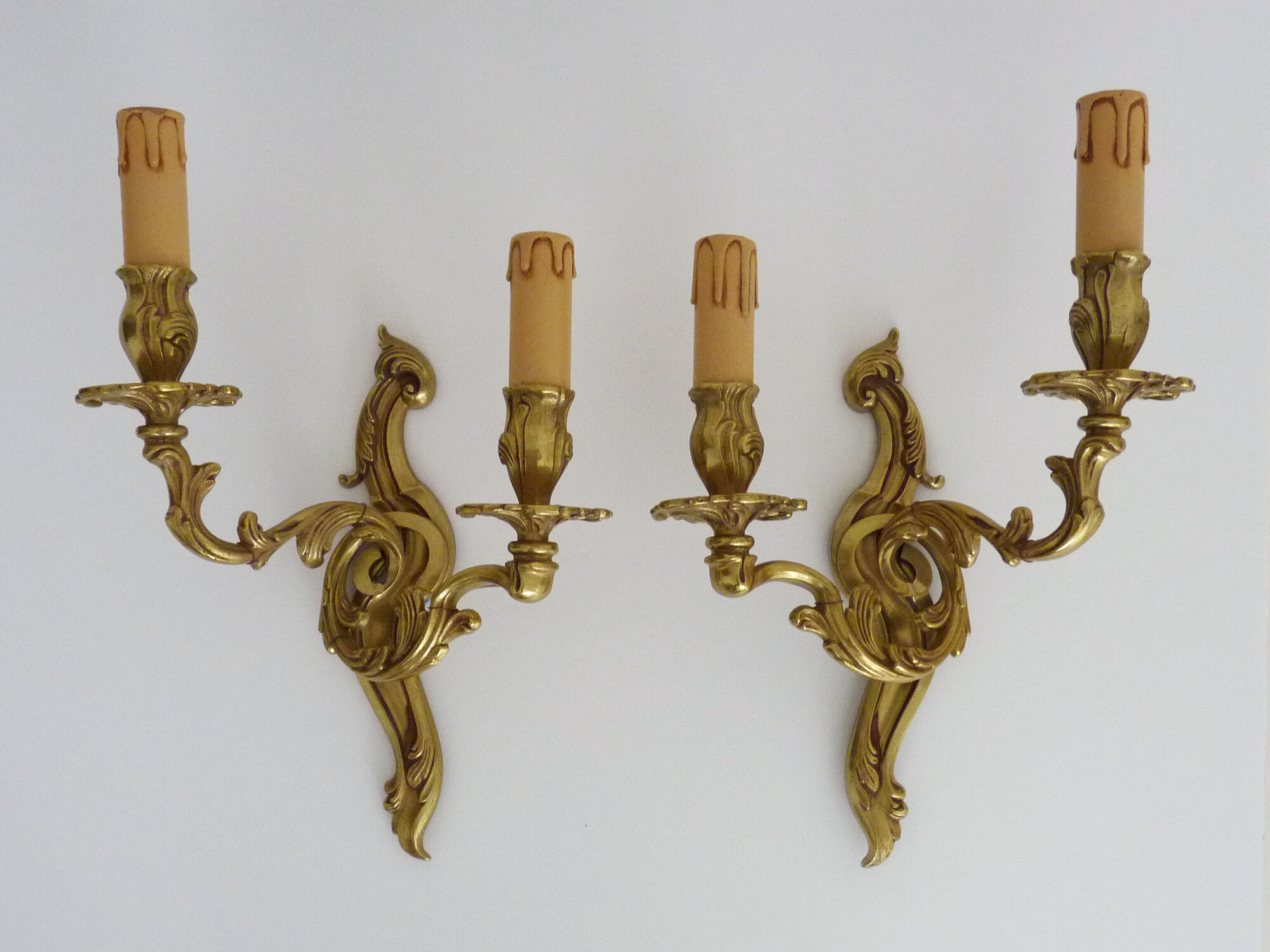 Old pair of wall sconces with double fires in bronze, 50s