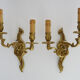 Old pair of wall sconces with double fires in bronze, 50s