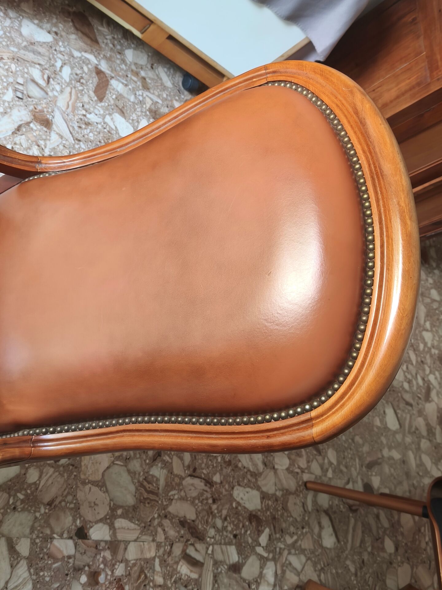 Leather armchair signed