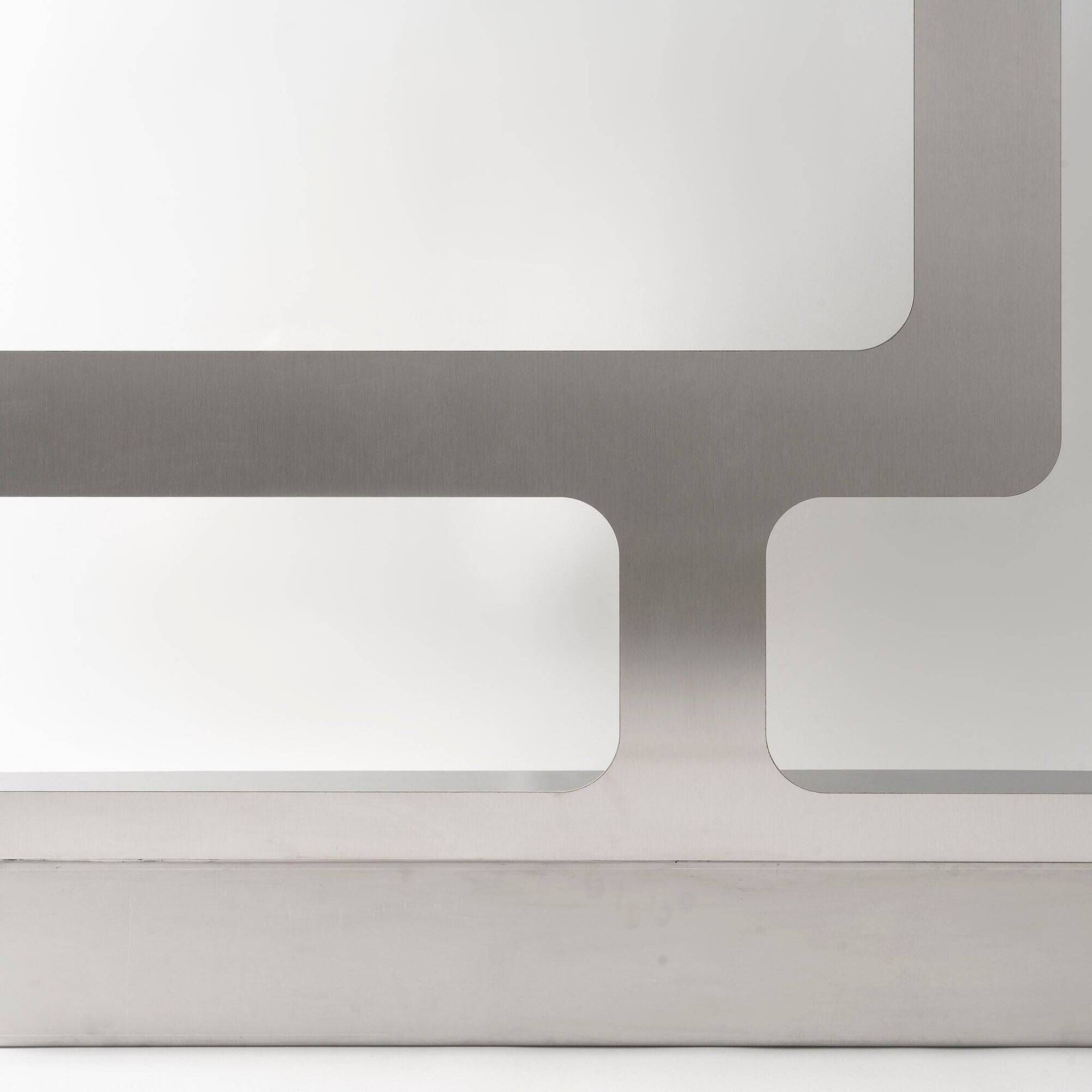 Pair of perforated brushed stainless steel screens, contemporary French work.