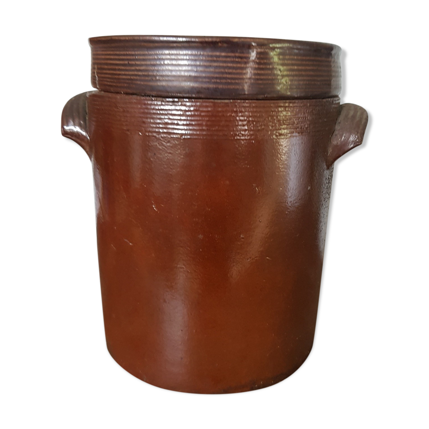 Old sandstone pot with lid