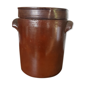 Old sandstone pot with lid