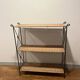 Rattan and wrought iron shelf