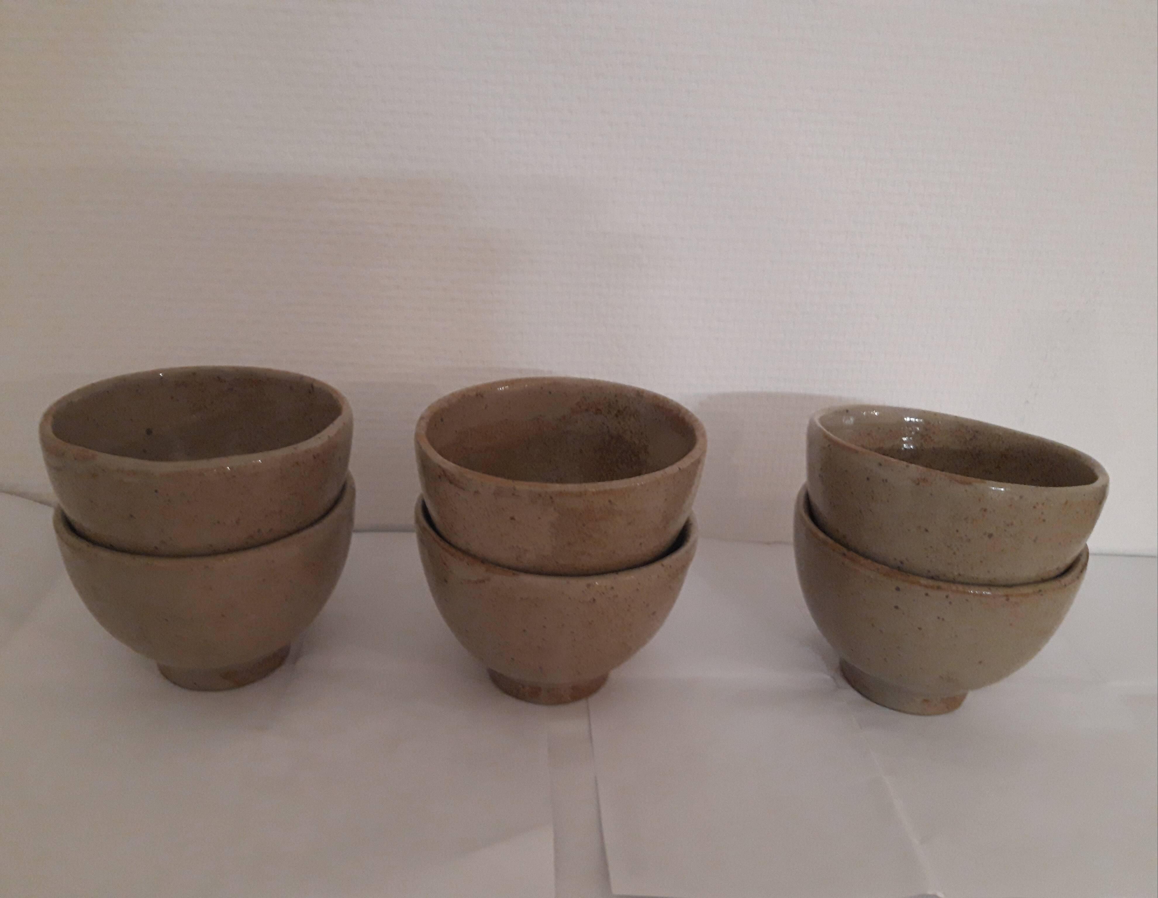 Suite of 6 sandstone cups