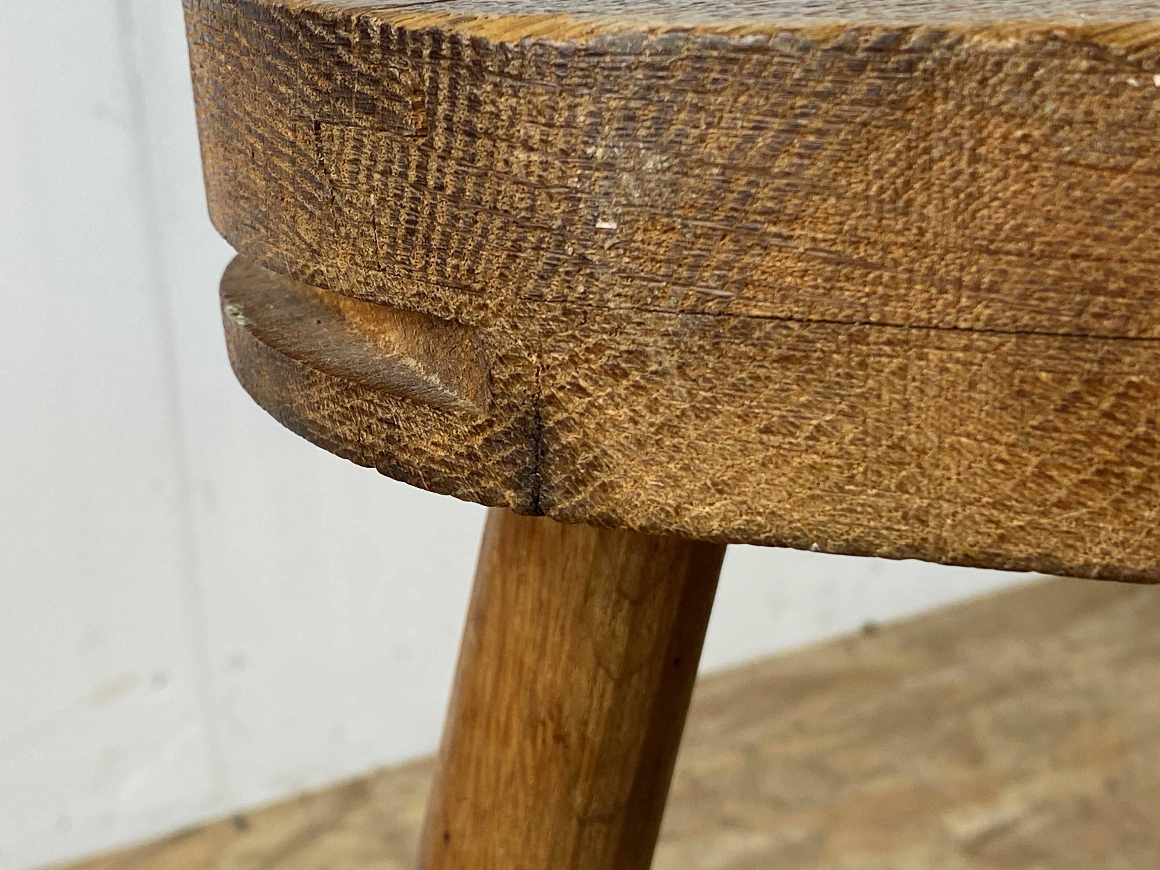 Set of 6 brutalist solid oak tripod farm stools from the 1950s