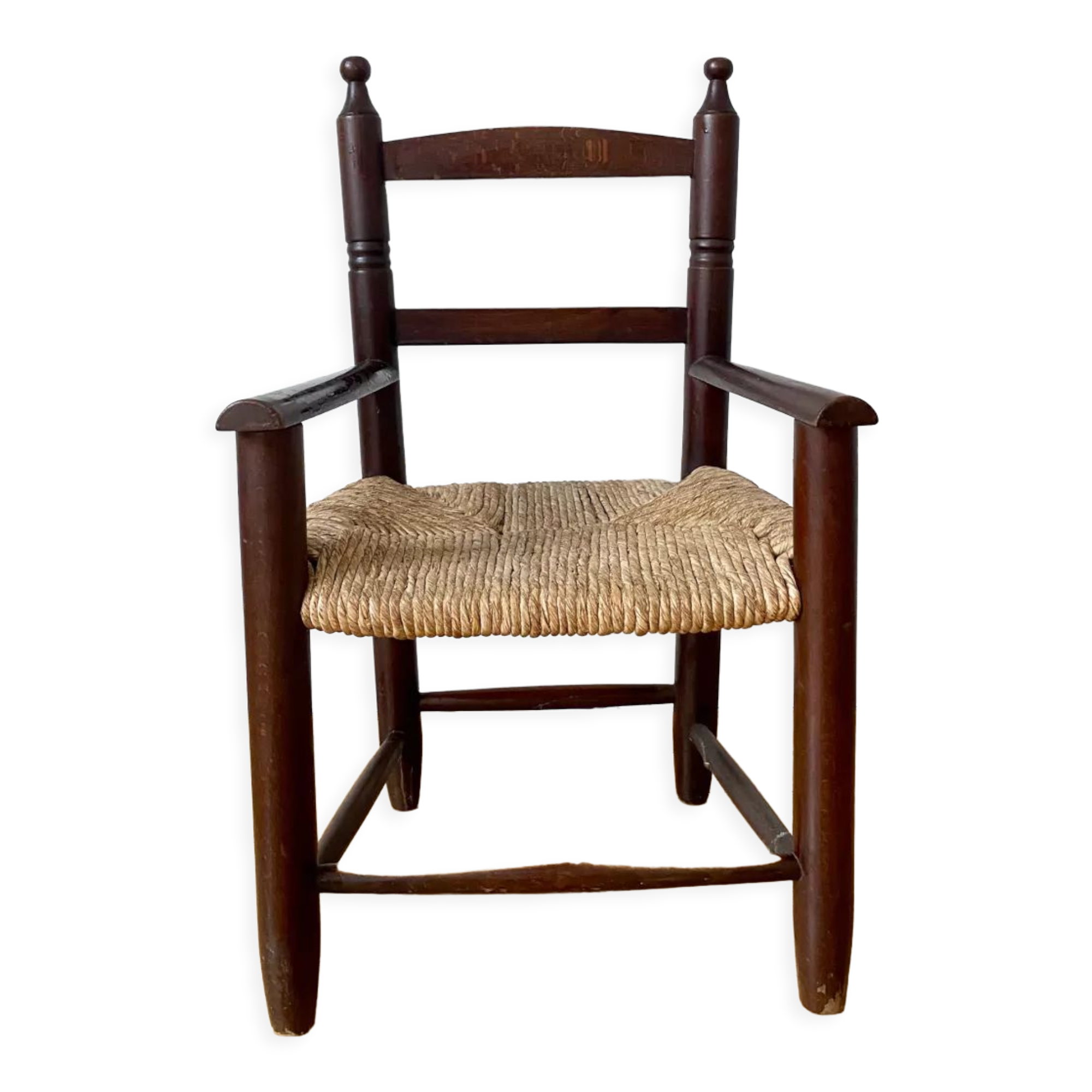 Wooden chair and children's straw