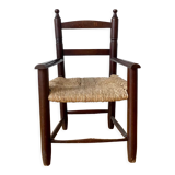 Wooden chair and children's straw