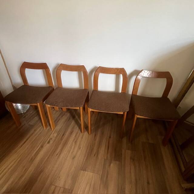 4 brown chairs