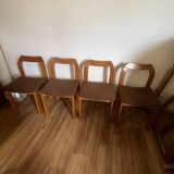 4 brown chairs