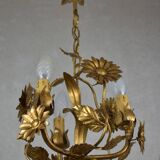 golden chandeliers with flowers.