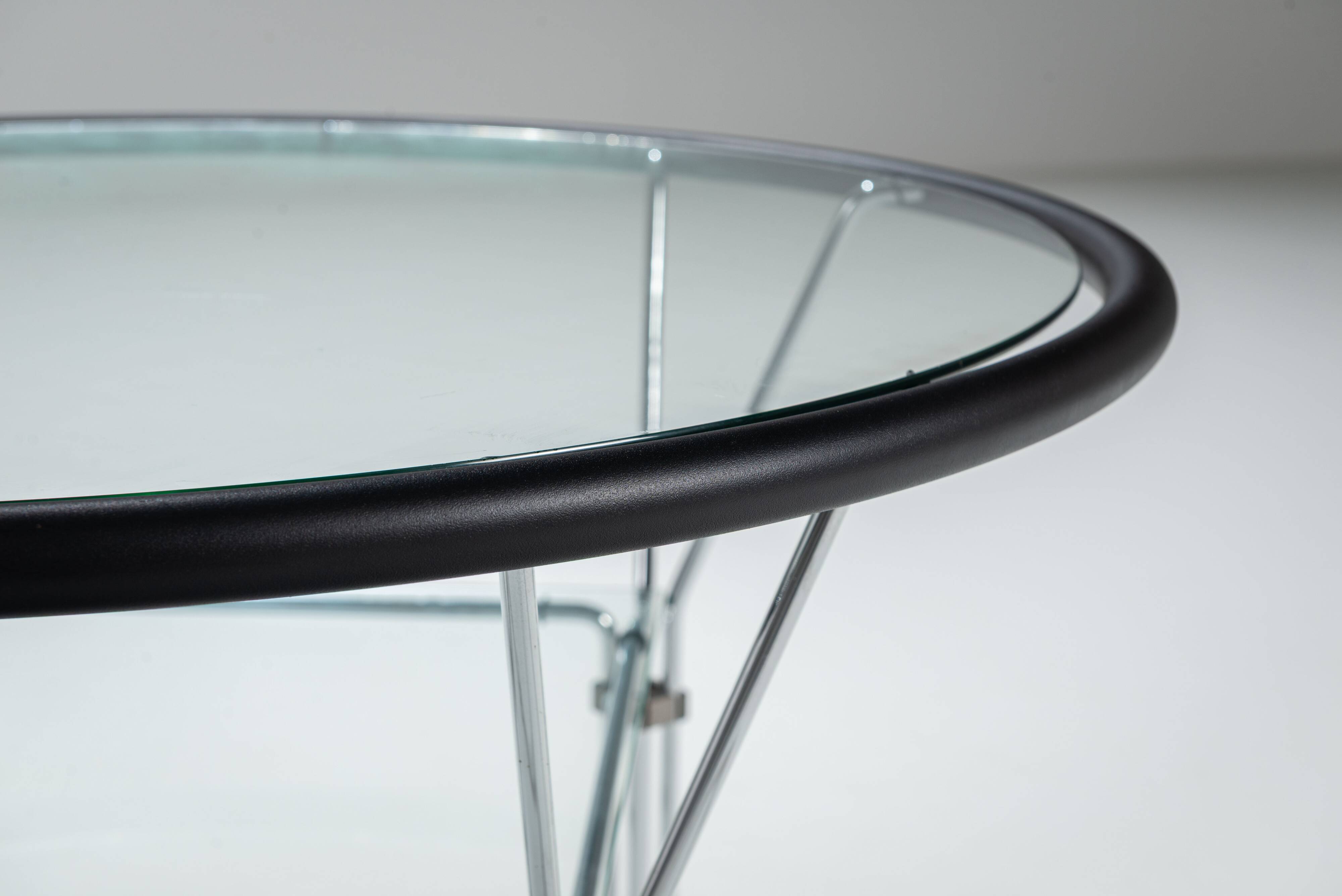 Post-Modern round glass and steel coffeetable attributed to Niels Bendtsen
