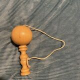 Vintage wooden cup-and-ball game