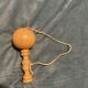 Vintage wooden cup-and-ball game
