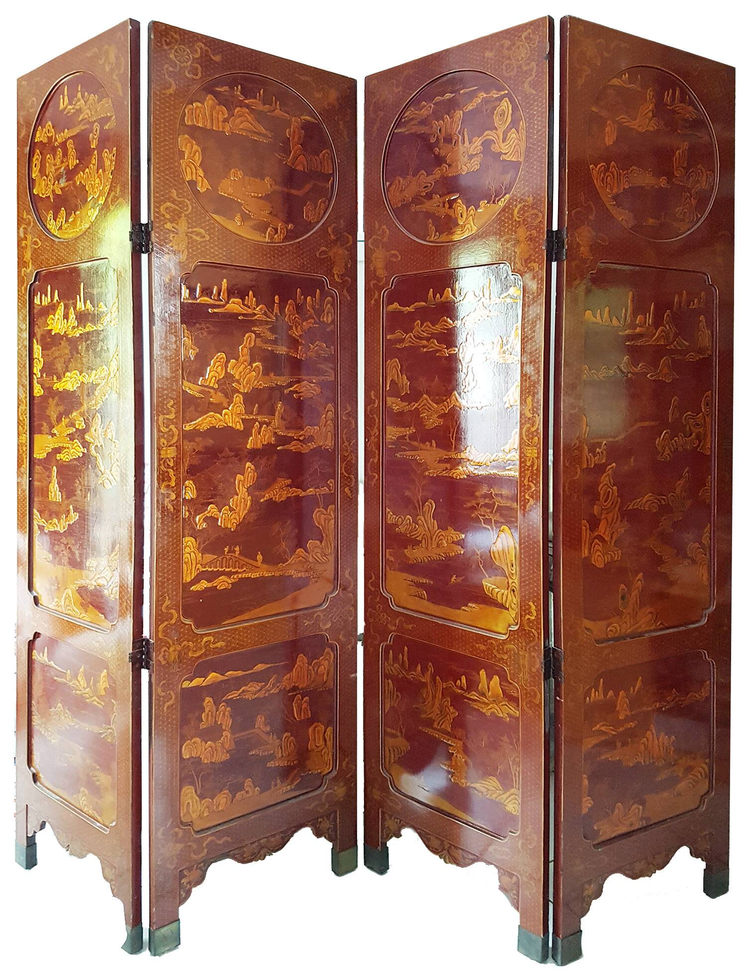 Four-panel Japanese-style screen in red and gold lacquer.