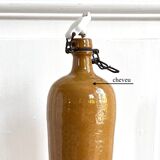 Bouteille ancienne en grès vernissé et bouchon en faÏence
