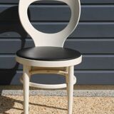 6 baumann chairs, white gull with black faux leather.