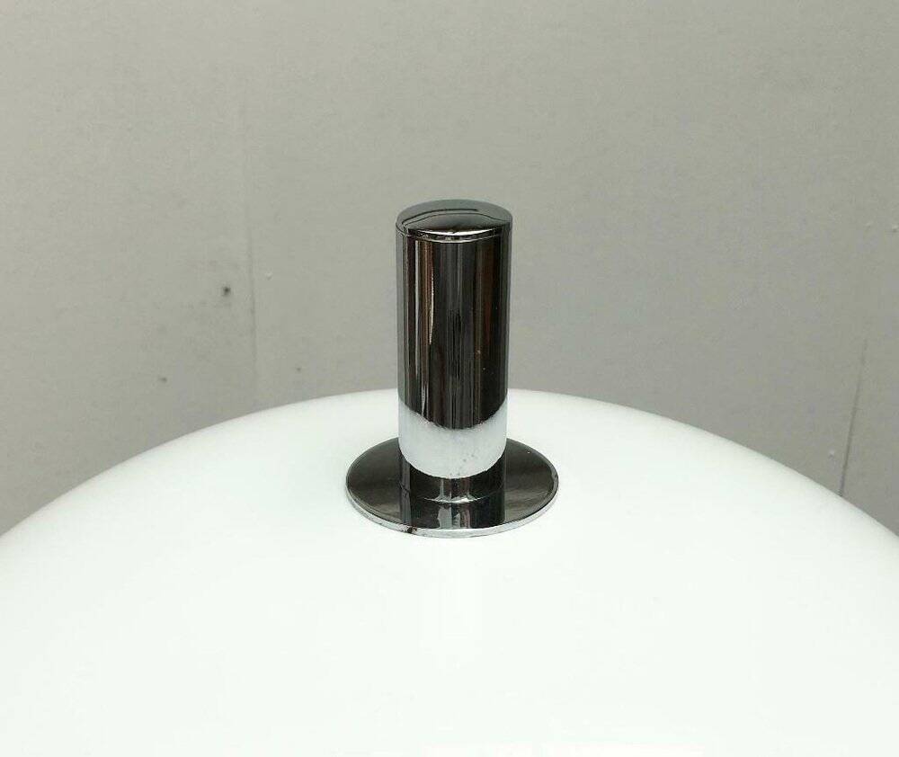 Italian space-style floor lamp from the 1960s with a stone base.