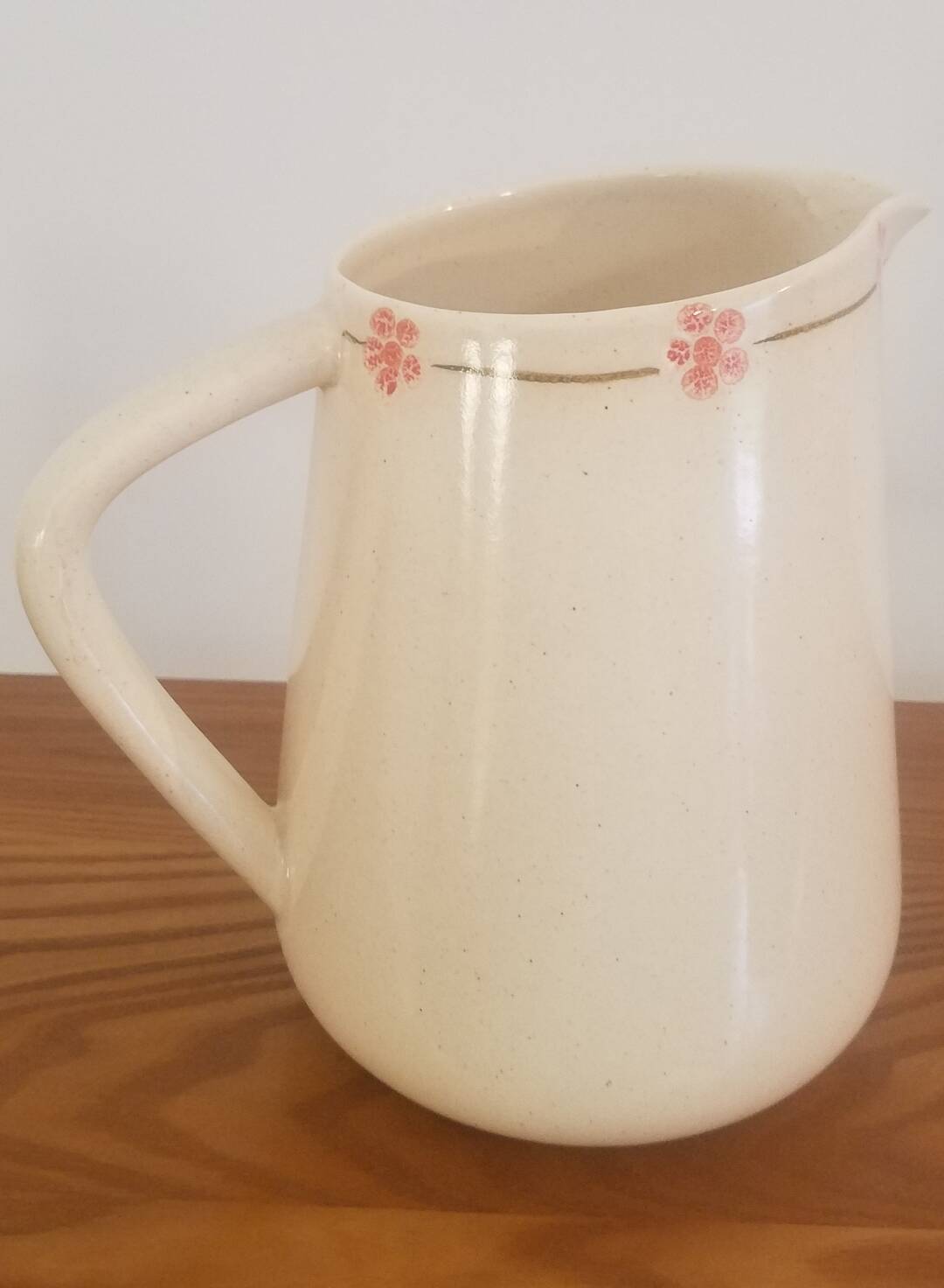 Hand-painted glazed ceramic pitcher