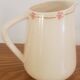Hand-painted glazed ceramic pitcher