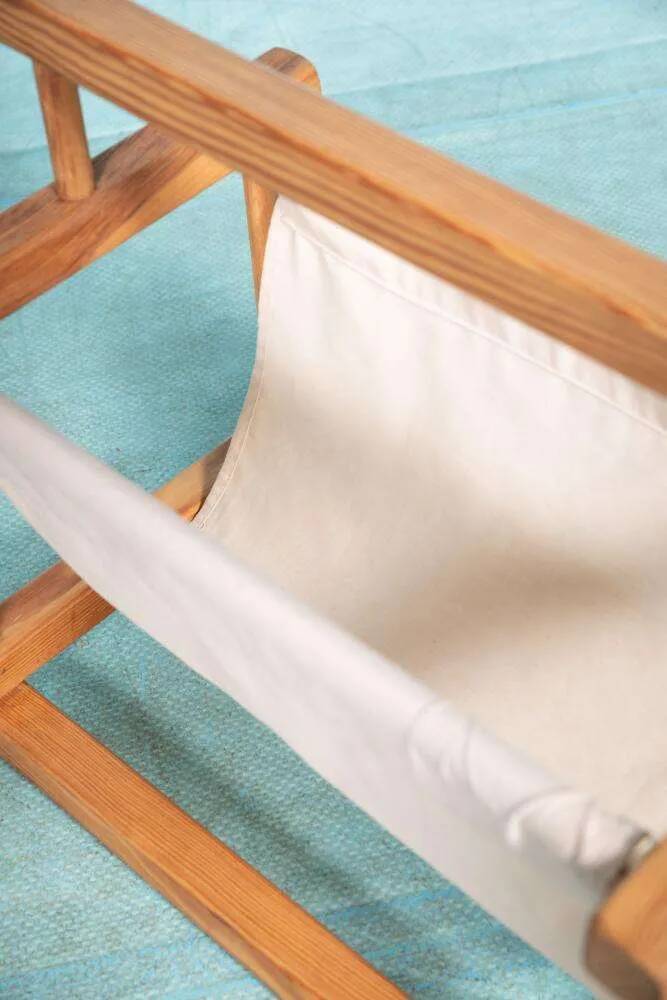 Bohemian magazine rack in vintage 70s pine style.