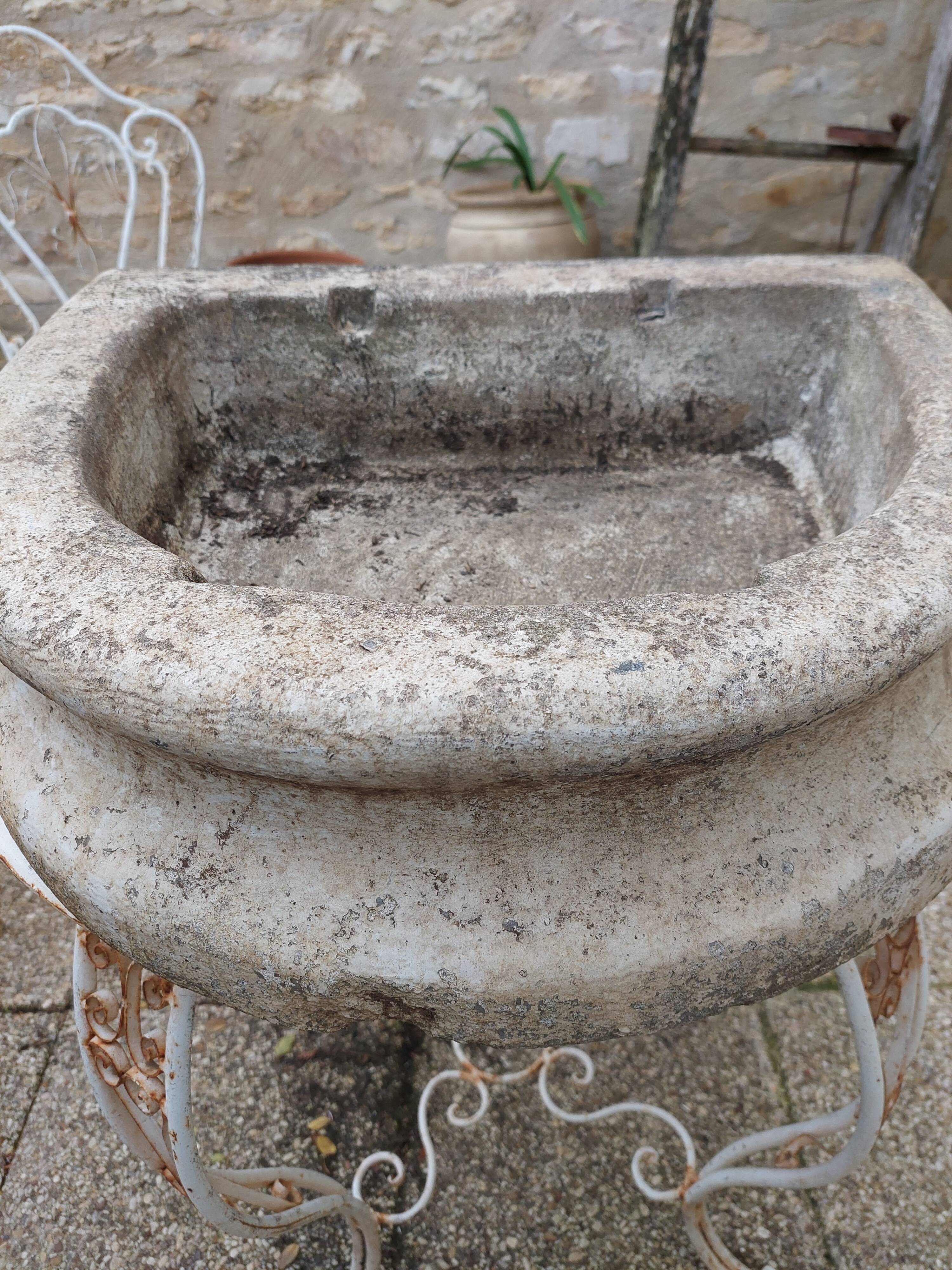 Reconstituted stone sink from the early 20th century.